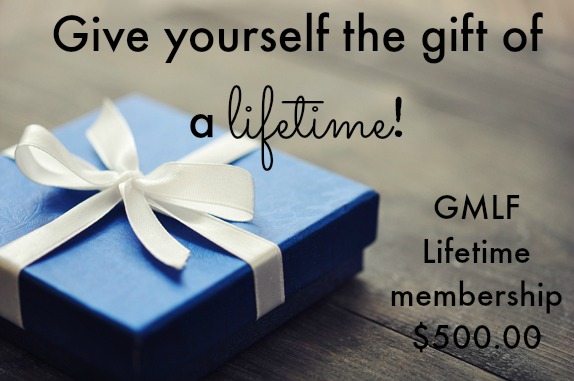 Blue elegant gift box on a wooden background